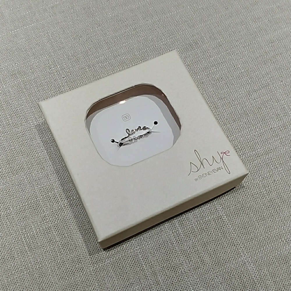 Sterling silver "love" script ring